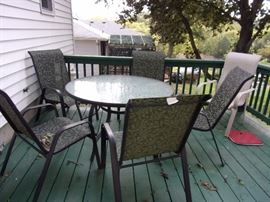 Patio etched glass top table and 6 chairs