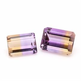 Loose 28.78 CTW Ametrine Gemstones: A loose 17.37 ct ametrine and a 11.41 ct ametrine gemstone.