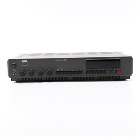 NAD Stereo Receiver: A NAD stereo receiver 7120, This unit was made in Japan and has a serial number 914435 and an FCCID of CDP8GM17120. It has a power source of AC120V, 60HZ, and 150W.