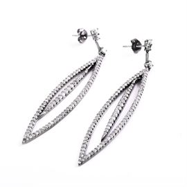 14K Blackened Gold Diamond Dangle Earrings: A pair of 14K blackened gold diamond dangle earrings.
