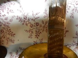 CLOSEUP OF SWORD MARKED "PITTSBURGH UNIFORM & TAILORING PITTSBURG PA"