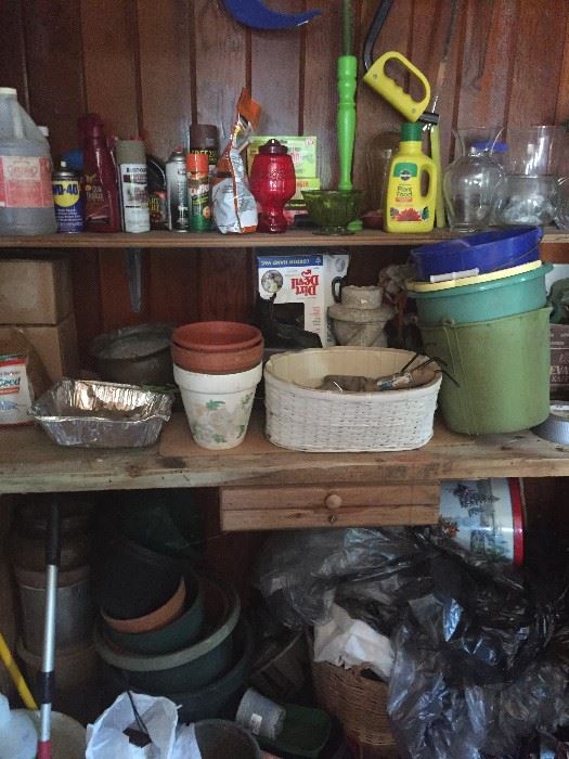 Lots of outside tools, flower pots, decor