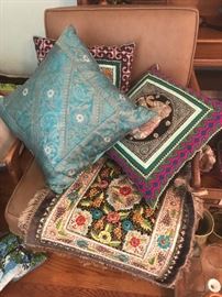 Indian pillows on a mid Century chair