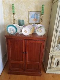 Pretty antique plates and TV cabinets