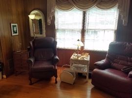 Leather recliners, wicker table and mirror