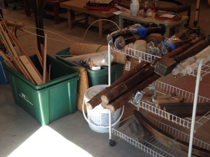 lots of odds and ends, furniture legs, caning supplies, wood dowels etc. a few tools