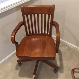 bankers rolling arm chair