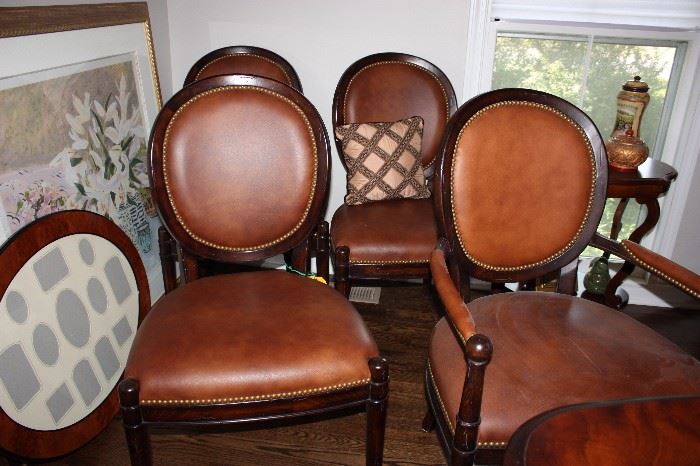 A few of the 8 Baker dining chairs