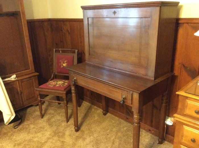 Antique desk, closed, on wheels with original hardware