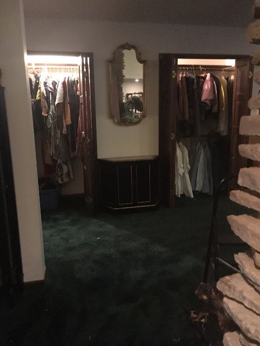 Foyer cabinet and mirror plus 2 closets full of vintage  clothing in the Closet Hall!
