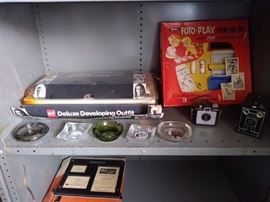 Vintage cameras and developing kits.