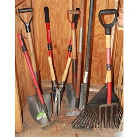 Group of Garden Tools: An assortment of gardening tools. Included is two sets of clippers, two shovels, one pitch fork, one hoe, and three rakes. Brands include True Temper, Garden Plus, and MintCraft Pro.