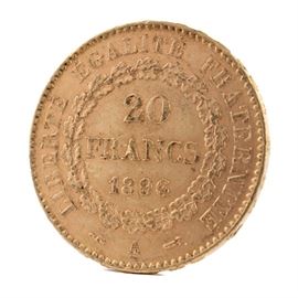1896 France 20 Francs Gold Coin: An 1896 France 20 Francs gold coin. This coin, with a fineness of 0.9000 and weight of 6.4516 g, features a standing genius writing the constitution, rooster at right, and fasces at left to obverse. The reverse depicts the denomination above the date within a circular wreath. Presented in a clear plastic sleeve.
