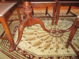 DETAIL OF DINING ROOM TABLE WITH 3 LEAVES AND PADS