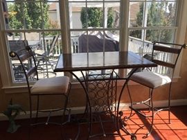 Bar height table and chairs