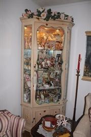 Curio loaded with Decorative Items