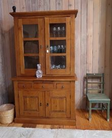 Primitive pine cupboard and painted green chair