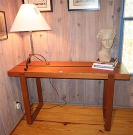 An amazing red oak console table with ebonized center stripe on banded legs, crafted by Bill Block