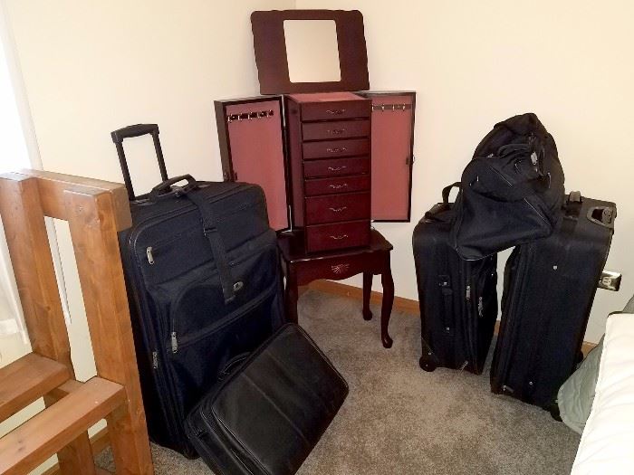 Luggage. Jewelry armoire