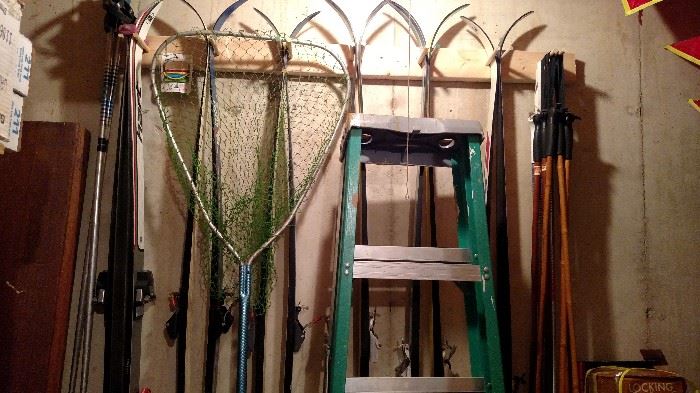 Ladders. Fishing poles and skiis