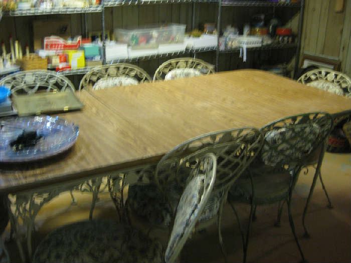 Woodard table has replacement formica top. Set will have 6 chairs