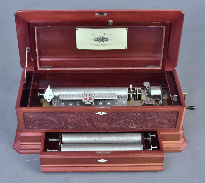 Swiss Interchangeable Cylinder Music Box
Ideal Soprano By Mermod Freres
with three cylinders, each 14 1/2"
case 32 1/2" x 15 1/2", 11" high
circa 1890