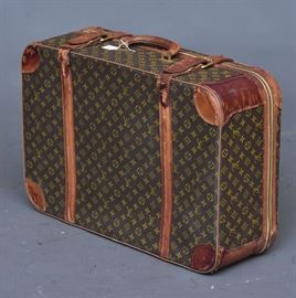 Louis Vuitton Suitcase
18" x 27" x 9"