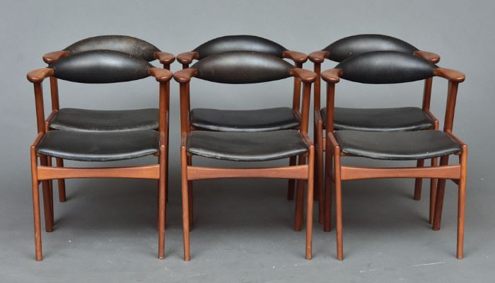 attributed to Hans Wegner Dining Chairs
six side chairs and an armchair
with leather upholstery
each 29 1/2" high, unsigned
mid-20th century