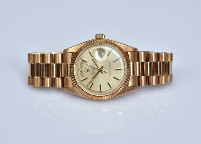 Rolex 18k Gold Presidential Gent's Watch
with day/date aperture
7" bracelet with two extra links