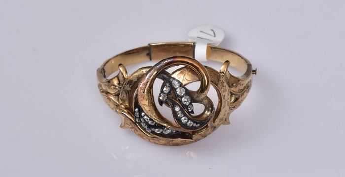 14k Gold Diamond Cuff Bracelet
set with mine cut diamonds
the bracelet with chased design
7" wrist, 16.45 dwt gross