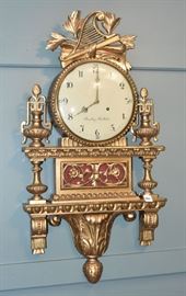 Swedish Neoclassical Giltwood Wall Clock
Beurling, Stockholm
with lyre crest and urn finials
with silk suspension
38" high, 19" wide
early 19th century
