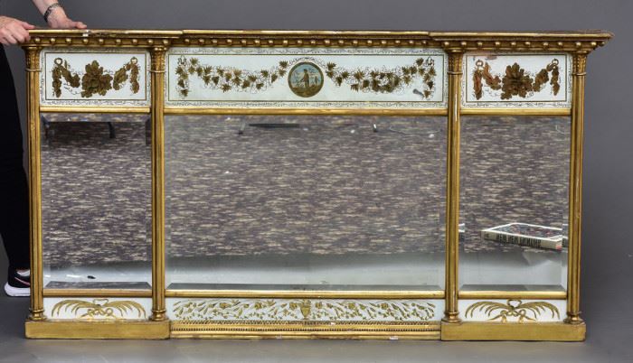 Federal Eglomise Overmantle Mirror
 with eglomise panels
67" wide, 35 1/2" high
circa 1790