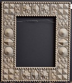 American Tramp Art Carved Frame
41 1/2" x 35 1/2" overall
28 1/4" x 22" rabbet
circa 1930's