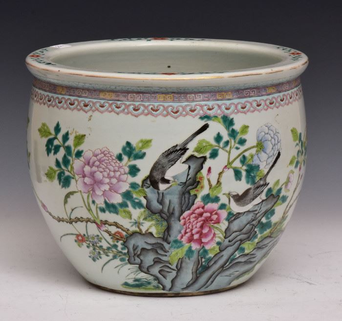 Chinese Porcelain Jardiniere
decorated with birds and flowers
9 3/4" high, 12" diameter
