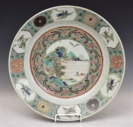 Chinese Porcelain Charger
decorated with fishing village 
and flying crane border
14 3/4" diameter
with Elinor Gordon label
dated on label ca. 1700