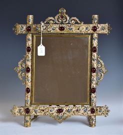 Brass Enameled Mirror
set with "jewels"
18" high, 14 1/2" wide
early 20th century