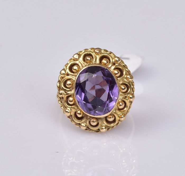 14k Gold Ring
set with purple stone
ring size 7, 5.5 dwt gross
