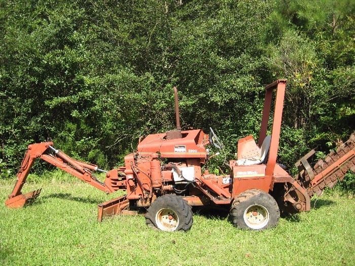 Ditch witch model 2300 (not running).With A 220 Backhoe.  Starting bid $1500.00