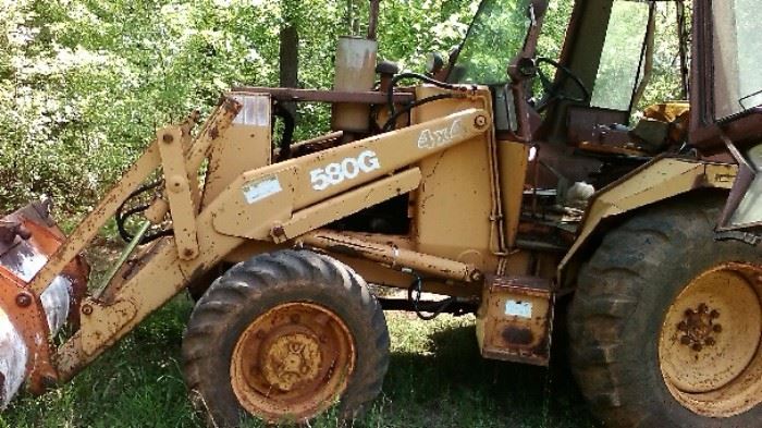 Case 580 G backhoe and trailer Starting bid $7500.00. Located in Jackson Georgia.