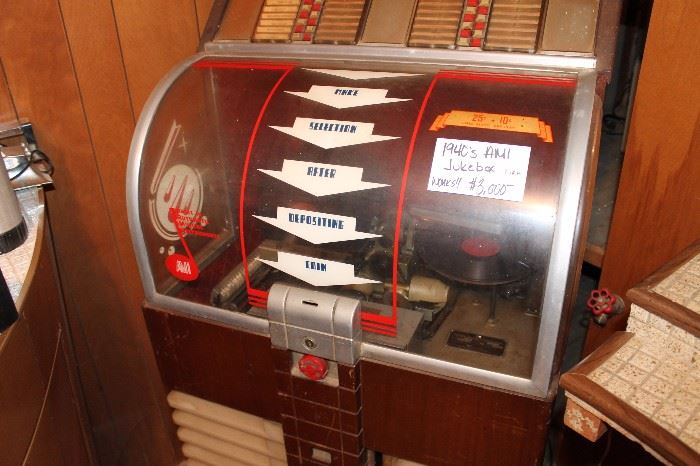 Vintage 1940s era AMI jukebox, works and plays, but selection components are not working