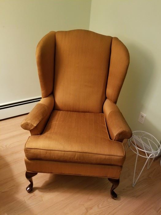Claw foot, rust colored armchair from Mazor Classic. Asking $55.00.