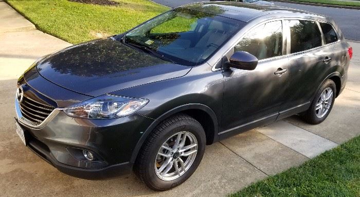Low mileage (approximately 42,500) 2013 Mazda CX-9 SUV. Asking $11,999, compare Kelly Blue Book Mazda with 63,946 miles value of  $14,966.00.
