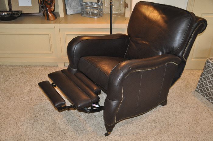 Super comfortable leather recliner with front wheels