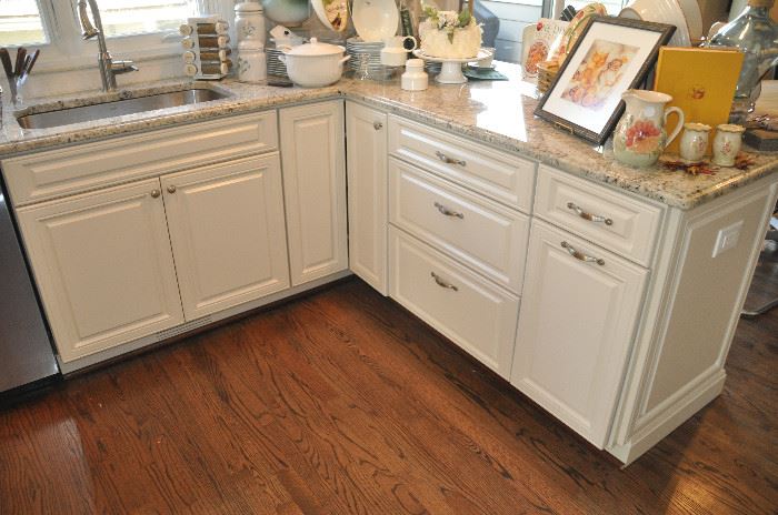 Entire Decora kitchen complete with cabinets, granite tops and Brion stainless steel hooded vent for sale!!  