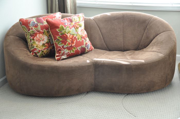 Also available is a Ligne Roset brown suede Pumpkin love-seat