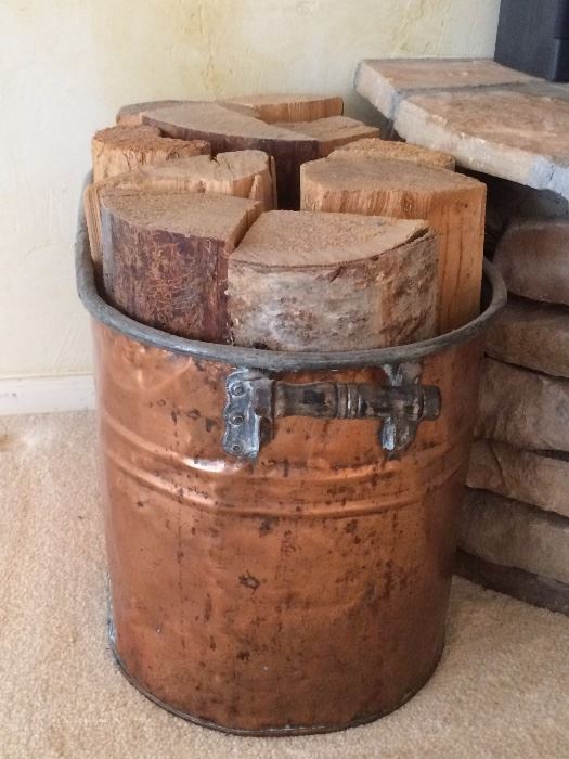 Copper tub with firewood 