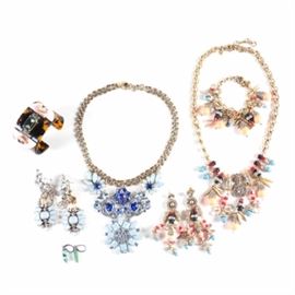 Collection of J Crew Jewelry and Sterling Silver Earrings: A collection of J Crew and sterling silver earrings. This collection includes two necklaces, two bracelets and three pairs of earrings. One of the J Crew sets is a Parure including a necklace, bracelet and earrings made with coral colored resin beads and foilbacked glass. Also included is a demi parure J Crew earrings and necklace with blue resin and foilbacked glass accents and a cuff bracelet of the same maker. The sterling silver earrings have a pair of rectangular turquoise beads are marked “P 925”, and have a total weight of 0.080 ozt.