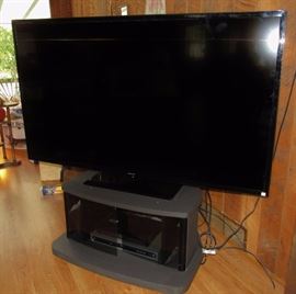 Samsung LED H6203 Series Smart TV - 65” purchased in 2016.  DVD Player (non-HD). TV Stand. 