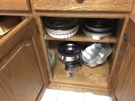 Items in Oak China cabinet - bottom