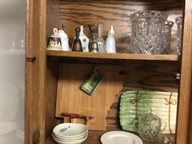 Items in Oak China cabinet - upper cabinet